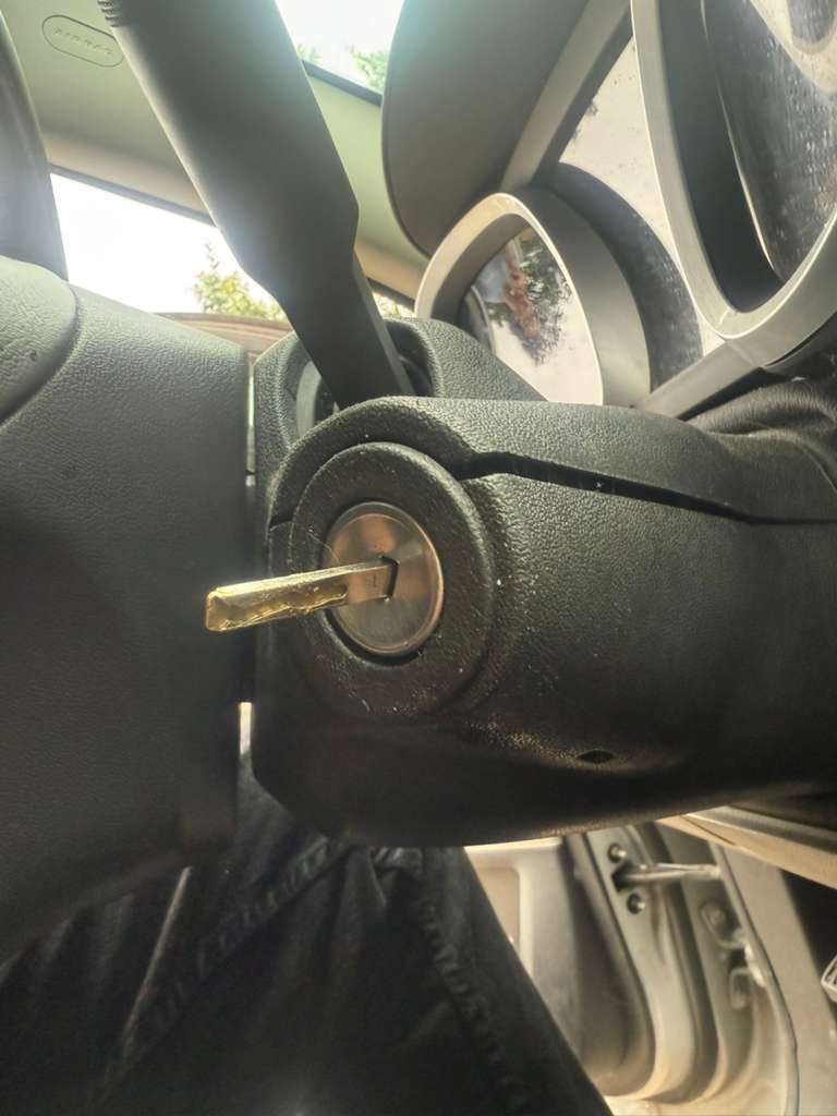 Vehicle key held in a keyed ignition